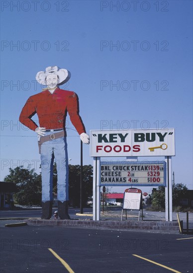 1980s America -  Key Buy Foods cowboy sign