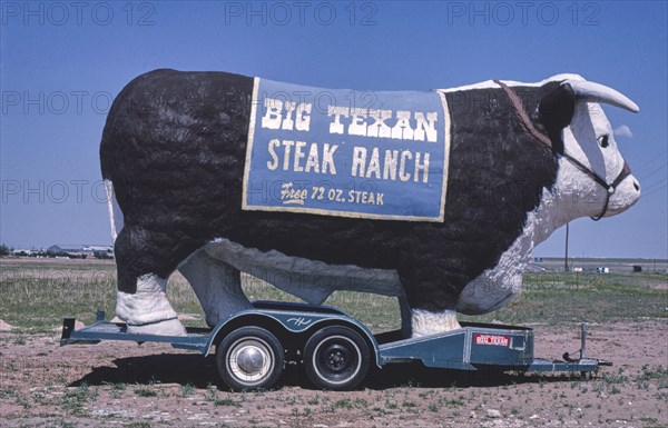 1980s America -  Bull-Big Texan sign, Amarillo, Texas 1982