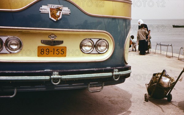 Front of a Leyland Royal Tiger coach, Haargaz Bus Company by the sea