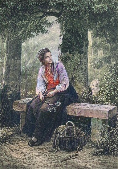 Young Mother Is Sitting On A Bench