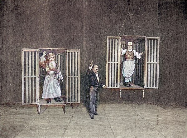 The Illusionist Thorn Demonstrates The Appearance And Disappearance Of Persons In Transparent Cages