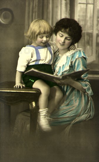 Mother Reading to Child.