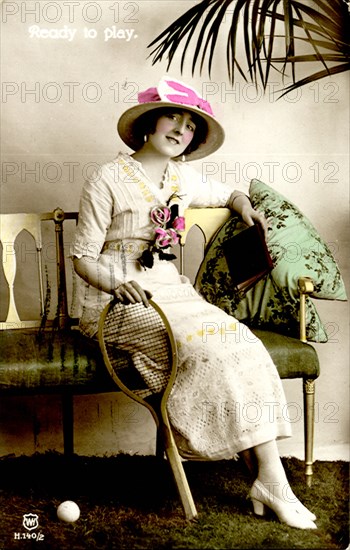 Lady Tennis Player on a Bench.