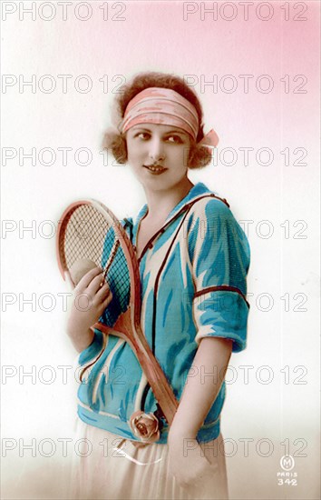 Tennis model with racquet.