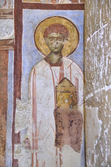 Lecce, township of Casalabate (Italy, Puglia, province of Lecce) abbey of Santa Maria di Cerrate, the church, interior, image of a saint, fresco (13th-14th century)