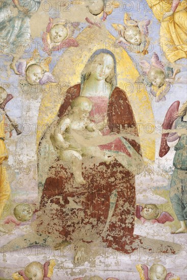 Panicale (Italy, Umbria, province of Perugia), Church of San Sebastiano. Madonna and Child, Musician Angels and Saints Augustine and Mary Magdalene, attribution to Raffaello Sanzio, fresco, around 1504. Detail