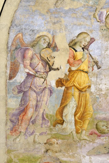 Panicale (Italy, Umbria, province of Perugia), Church of San Sebastiano. Madonna and Child, Musician Angels and Saints Augustine and Mary Magdalene, attribution to Raffaello Sanzio, fresco, around 1504. Detail