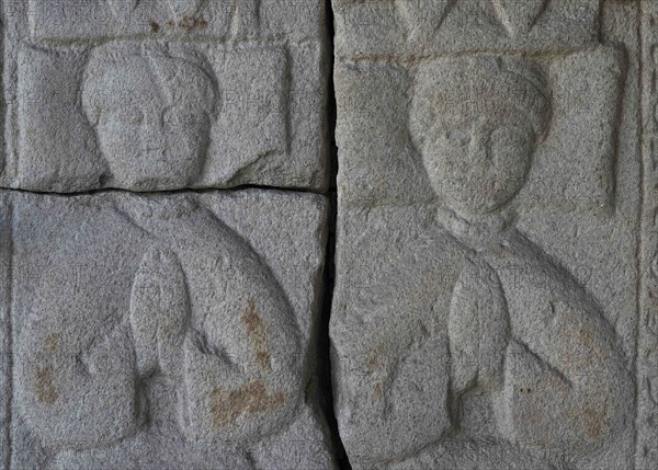 Tombstone with relief depicting two praying figures