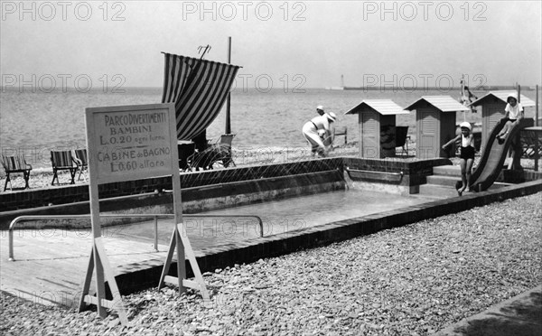 Italy, amusement park for children on the beach, 1933