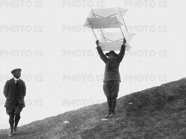 italy, the top of bisbino mountain, boy scout throwing the kite flying deer, 1910-20