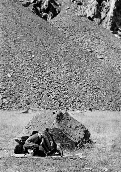 A Muslim hunter in prayer. 1930