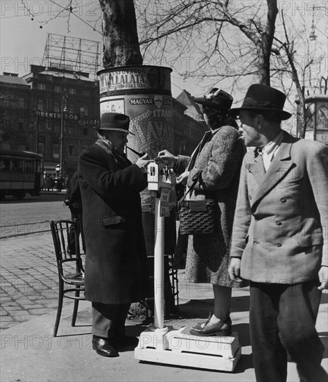 Public balance on a sidewalk in Budapest. 1957