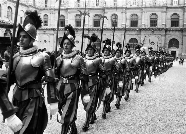 Swiss guards ready for the solemn rite of the oath. 1957