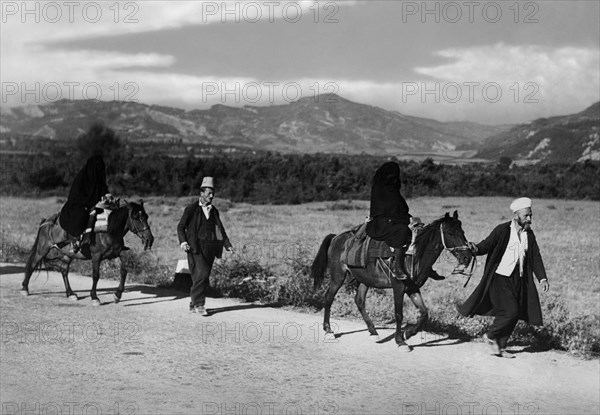 Albanian couples on horseback. 1942