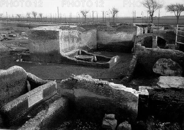 Lazio. sepulchral area of Ostia Antica next to the highway. 1930