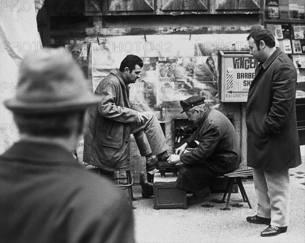 Italy. Lazio. Rome. shoeshine. 1971