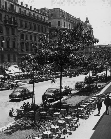 Italy. lazio. rome. via veneto with the tables and the dome of the hotel excelsior. 1958