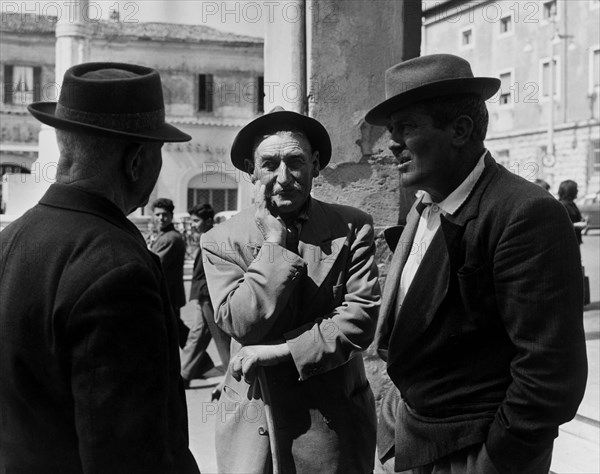 Italy. Lazio. farmers in the square. Arpino. 1965