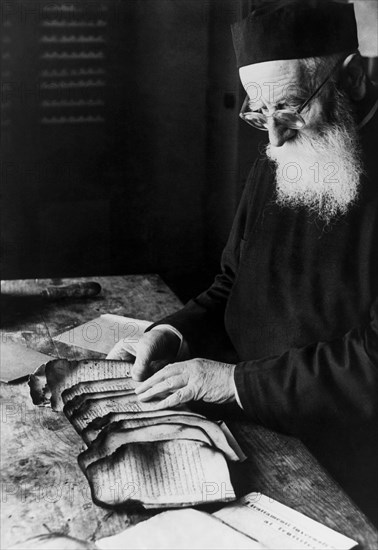 Italy. lazio. monk restorer of books in grottaferrata. 1965