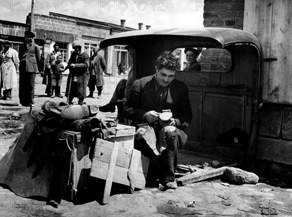 Turkey. kars. Armenian cobbler in the market square. 1960