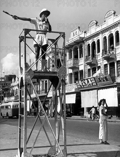 Southern vietnam. saigon. a policeman in the center of cholon. 1958