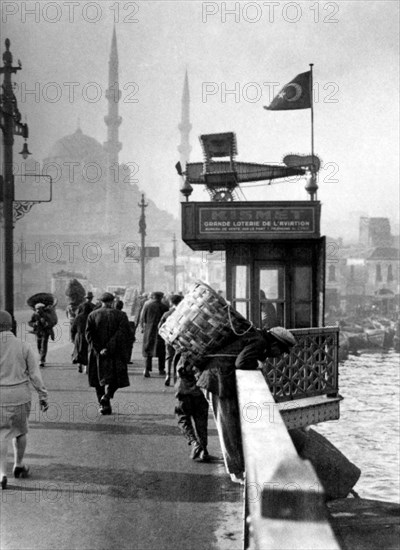 Turkey. istanbul. galata bridge. in the background the mosque of the sultan validè. 1951