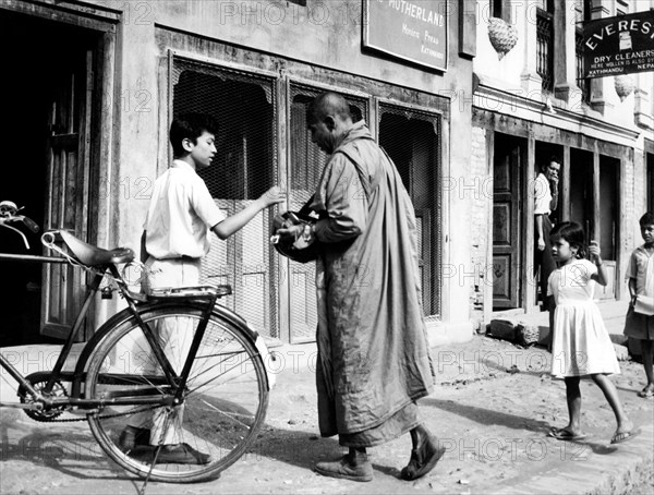 Nepal. kathmandu. begging Buddhist monk. 1967