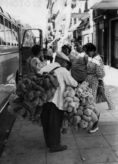 Sponge seller. athens. greece. 1958