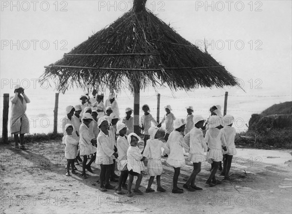 Lazio. children of the colony on the beach at Ostia. 1920-30