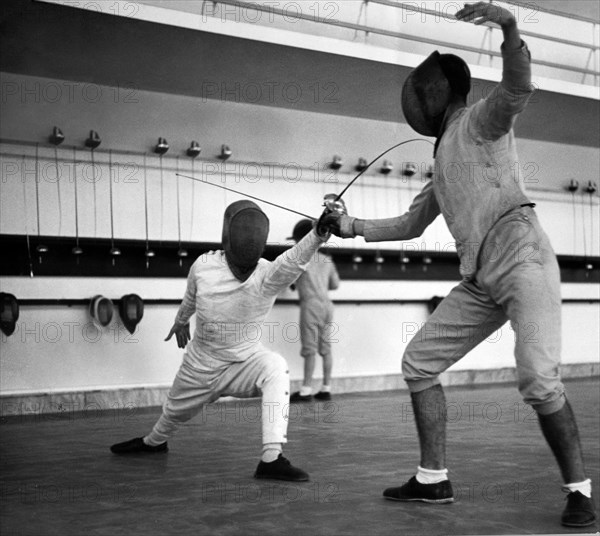 Italy. Rome. fencing exercise for the academicians of the forum of Mussolini. 1939