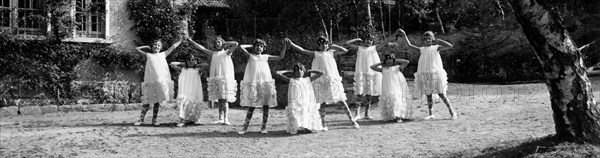 Italy. Summer Camp. Little Girls Dancing In The Garden. 1910-20