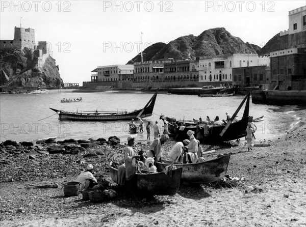 Oman. Muscat. The Harbor Bay With The Portuguese Fort Of Jalali On The Left. 1957