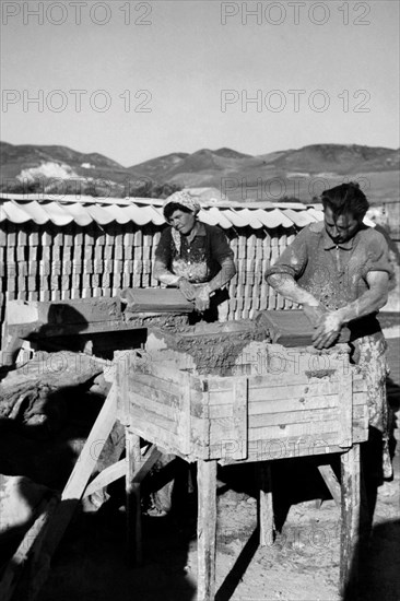 Women Working At The Bricks Factory. Catanzaro Marina. Calabria. Italy. 1952