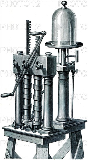 Air pump with two cylinders and valves.