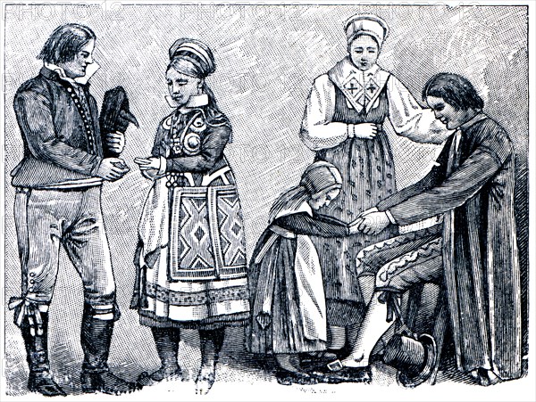 Bride and groom and peasant family in the Swedish national costumes.
