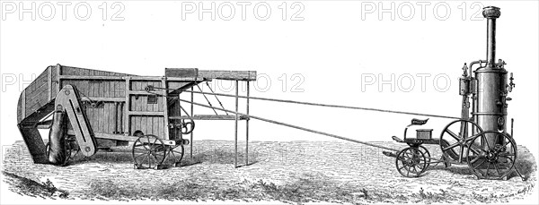 Small mobile steam thresher.
