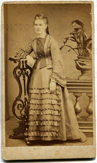An antique photo shows woman.