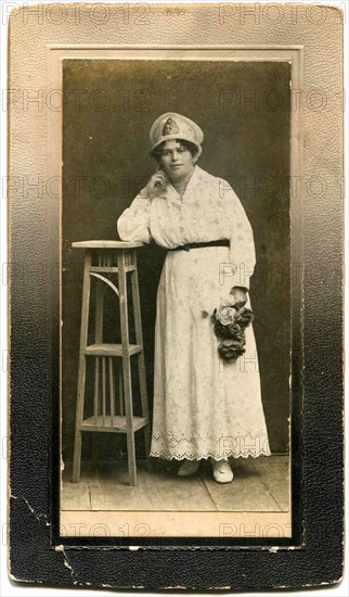 A woman in a cap.