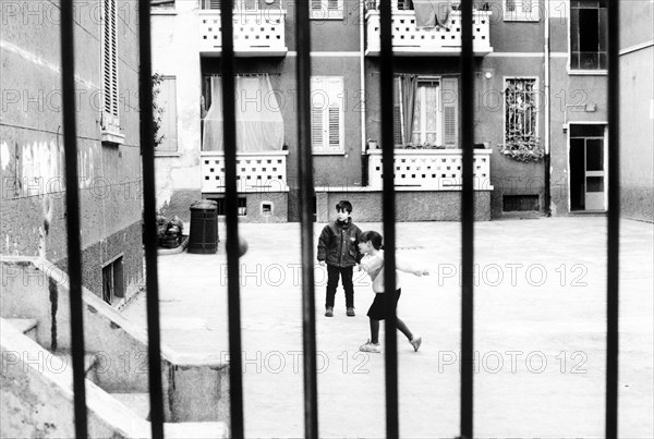 Children playing in the yard.