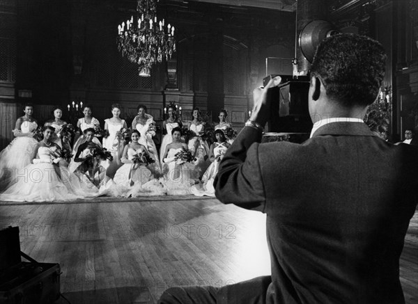 Afro American women to the debutantes' ball.