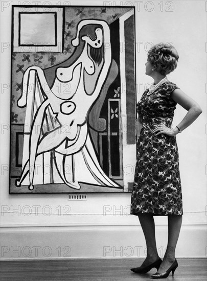 Visitor admires a picasso at the London gallery.