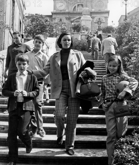 Lucia Bose With Their Children On The Streets Of Rome.