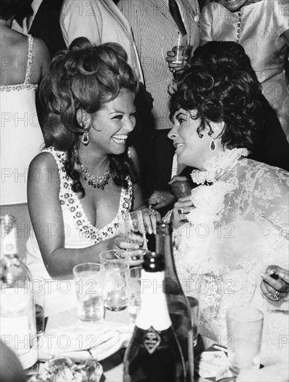 Claudia Cardinale and Liz Taylor.