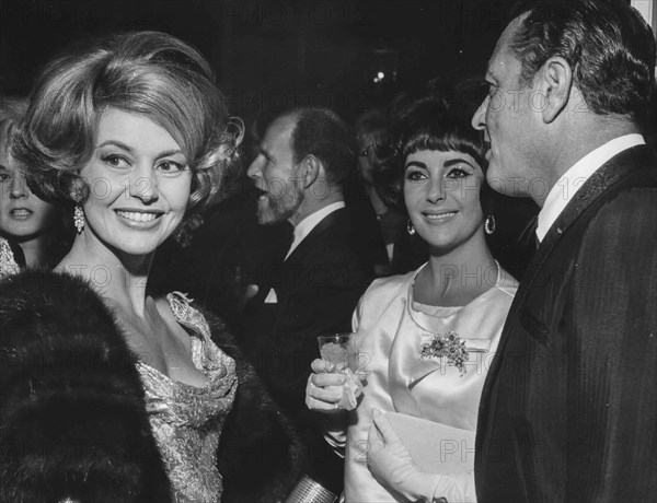 Cyd Charisse, Liz Taylor and Tony Martin.