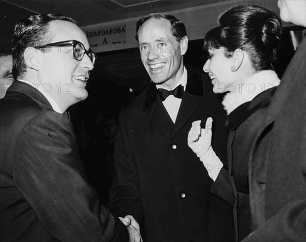 Mel Ferrer, Audrey Hepburn and Dino De Laurentiis.