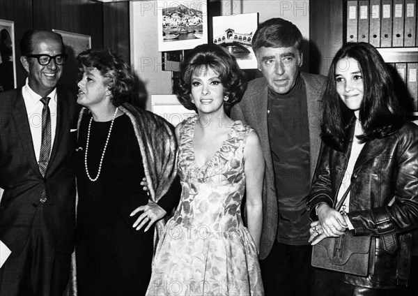 Gina Lollobrigida, Shelley Winters and Peter Lawford.