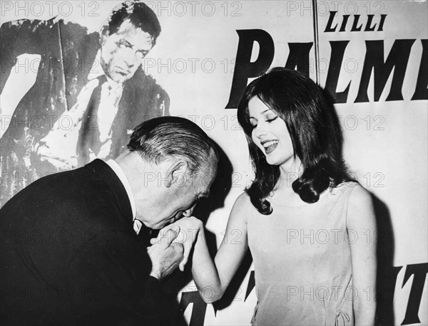 William Holden and Pamela Tiffin.