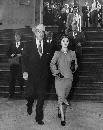 George Stillman and Shirley Temple Leaving Court After Separation From Husband John Agar.