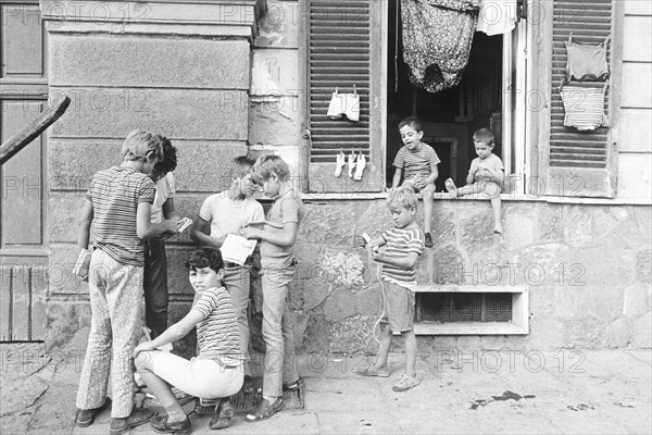 Italy, boys playing in the street, 1970