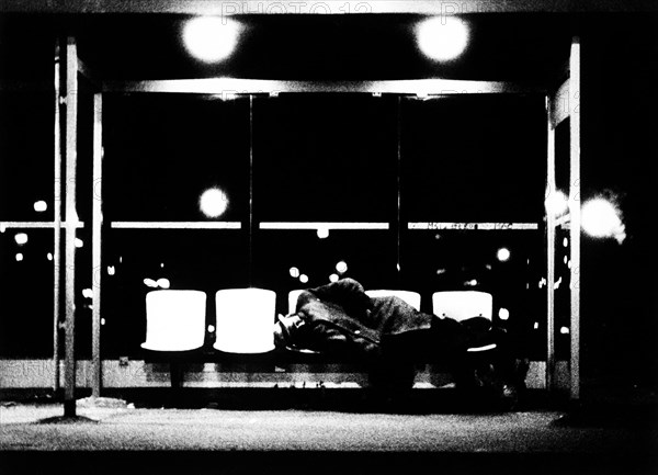 Italy, Milan, homeless sleeping at the tram stop, 70s